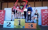 Szymon Gużkowski drugi od prawej na podium