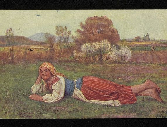 Obraz - Kobieta leżąca na trawie